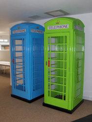 A blus Phoney Box and a green Phoney Box installed in an office